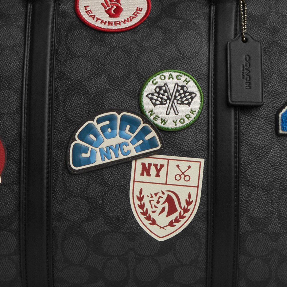 Coach Outlet Men's Venturer Bag In Signature Canvas With Patches - Picture 2 of 12